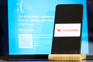 The CrowdStrike logo and a blue computer screen appeared during mass tech outages worldwide, causing IT systems to shut down. The Microsoft system error was caused by CrowdStrike.
